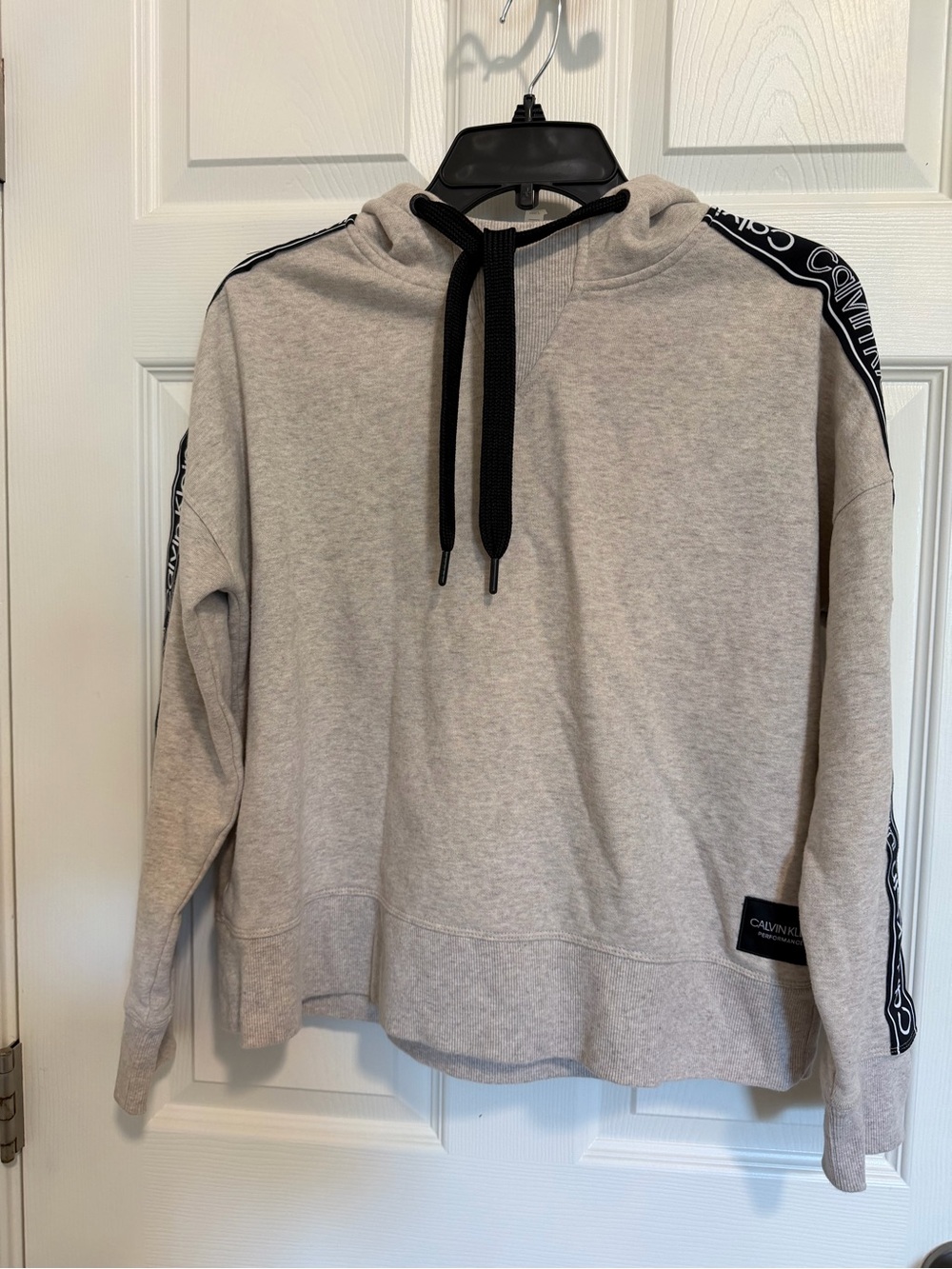 Calvin Klein Light Cream Sweatshirt with Black Logo Patch
